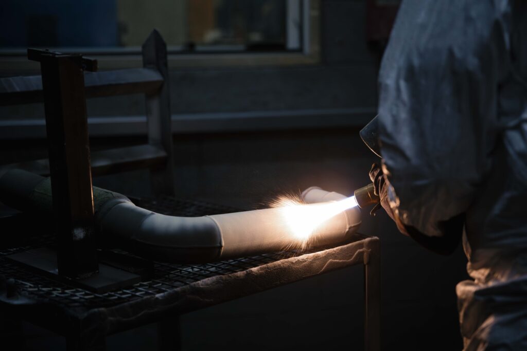 Ground metal component during precision finishing process