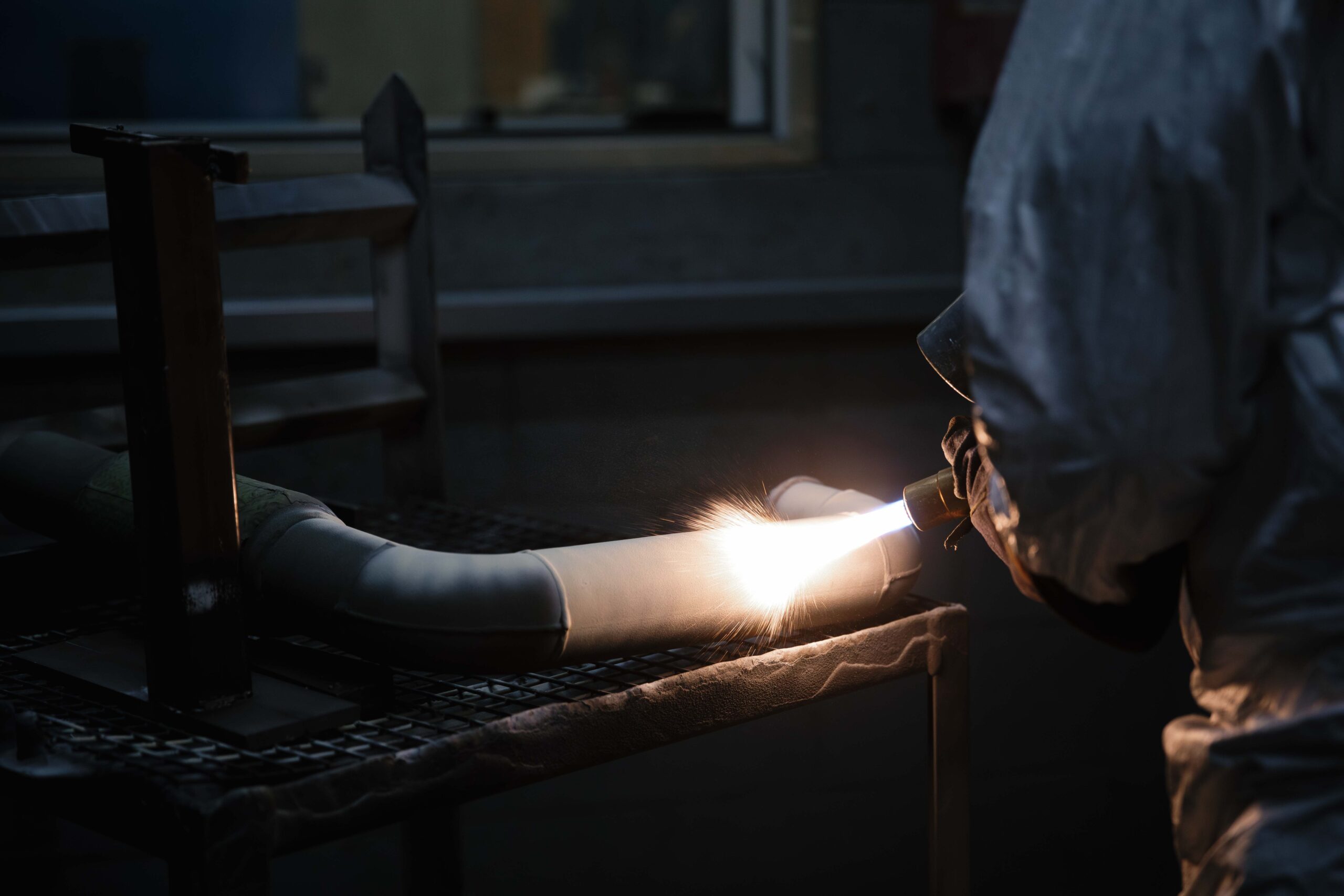 Ground metal component during precision finishing process